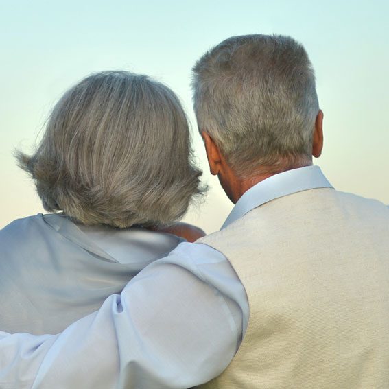 Two's Company older couple looking at sunset